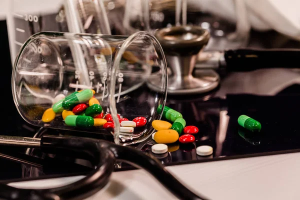 Medicine and medical instruments on table — Stock Photo, Image