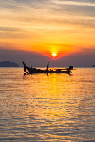 sunshine above fishing boat.