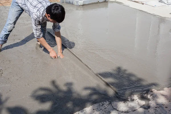 Stock image labors are construction new floor