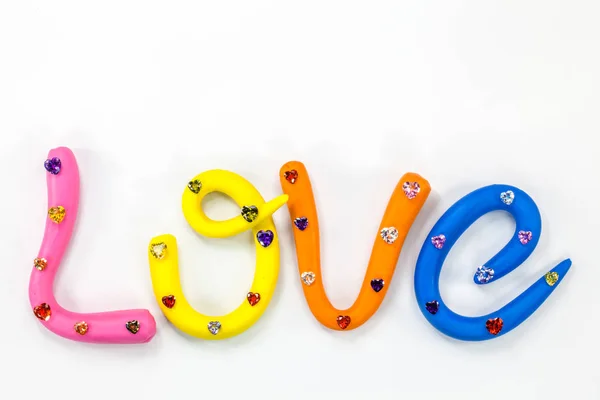 A palavra amor em alfabeto colorido para o dia dos namorados — Fotografia de Stock