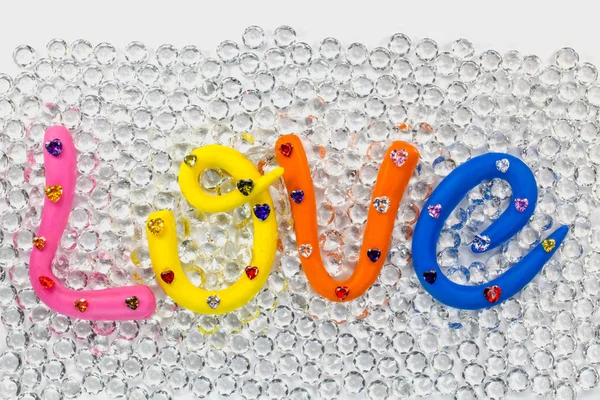A palavra amor em alfabeto colorido para o dia dos namorados — Fotografia de Stock