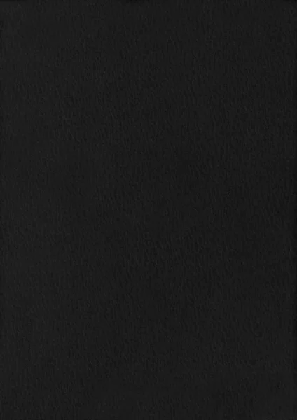 Dapple schwarzes Papier gewellt Textur Hintergrund. — Stockfoto