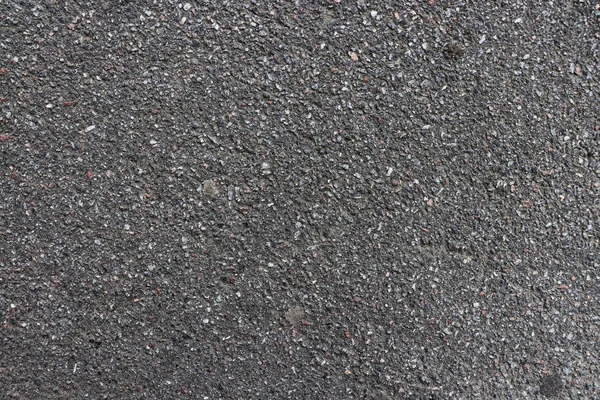 Textura de asfalto rodoviário. Estrutura de betume . — Fotografia de Stock