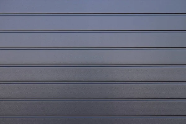Donker grijs geschilderd gegolfd stalen hek Texture Wall — Stockfoto