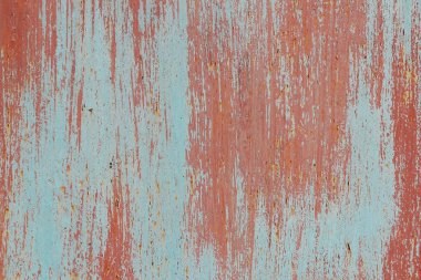 Kırmızı boyalı duvar doku üzerinde mavi Rusty yıpranmış. Fırça darbeleri.