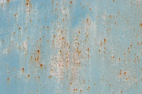 Rusty Grit op blauwe verf muur textuur. Penseelstreken. — Stockfoto