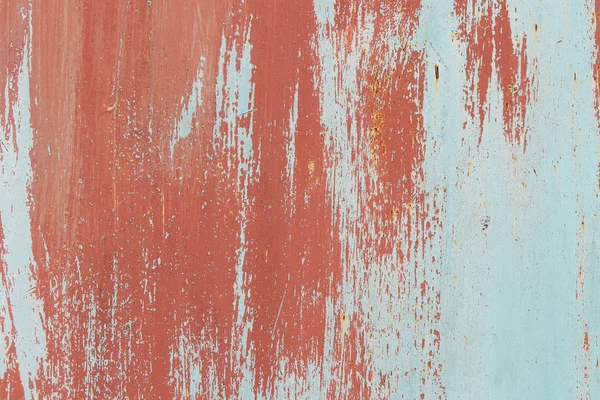 Rouge altérée sur une texture murale bleue rouillée peinte. coups de pinceau . — Photo