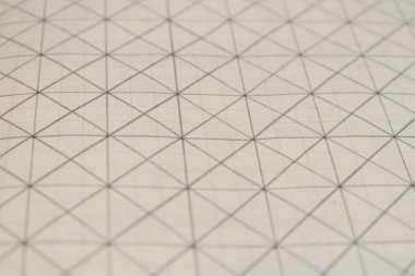 Kalem çizilmiş kılavuz bir not defteri sayfası. Düz çizilmiş çizgiler.