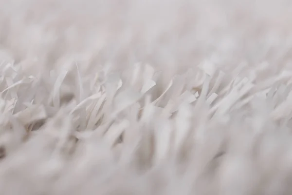 Bianco trama erba artificiale con sfondo sfocato. Moderna s — Foto Stock