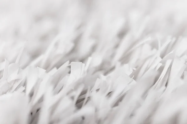 Weiße Kunstrasen-Textur mit verschwommenem Hintergrund. moderne s — Stockfoto