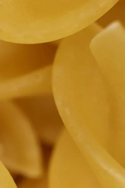 Spiraal Pasta Macro close-up. Achtergrondstructuur. — Stockfoto
