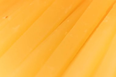 Katı peynir dilimleri makro portre. Arka plan doku.