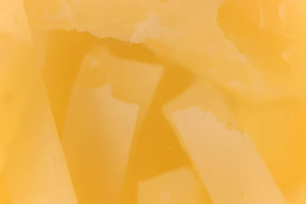 Solidní makro detailní sýr. Textura pozadí. — Stock fotografie