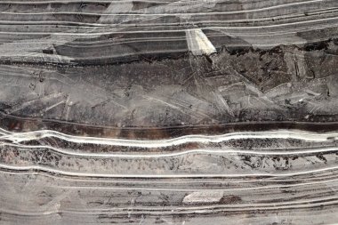 Buz desen yüzey arka plan doku. Donmuş gölde buz satırlarının dalgalı çizimler.