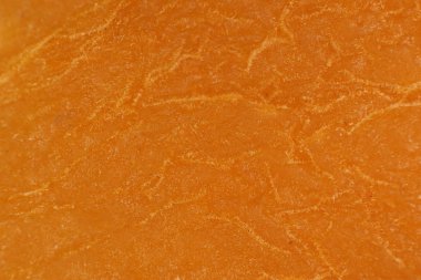 Turuncu kayısı doku kurumuş. Sıcak doğa organik arka plan. Makro bakış.