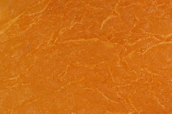 Sušené oranžová meruňková texturu. Vřelému ekologické pozadí. Detailní makro. — Stock fotografie