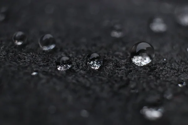 Water drops on black leather. Wet background texture. Macro Closeup. — Stock Photo, Image