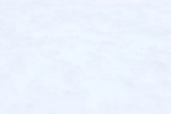 Einfache Textur der Schneeoberfläche. Winter verschneiten Hintergrund. — Stockfoto
