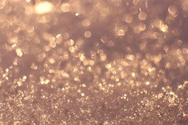 Kar yüzey Bokeh doku. Kış sıcak zemin. Yumuşak bulanık Noel Glitter arka plan.