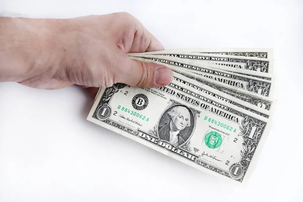 Ręku Stos Pieniędzy Broń Posiadająca Banknoty Dolarowe Stanów Zjednoczonych Ameryki — Zdjęcie stockowe