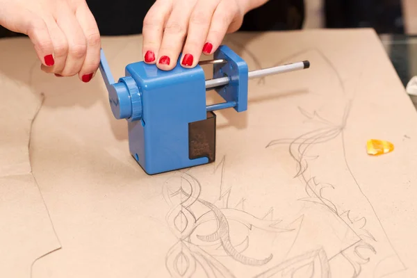 Sewing textile or cloth. Work table of a tailor. Textile tools ...