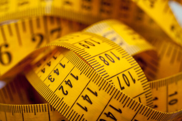 Measuring tape on textile shallow depth of field