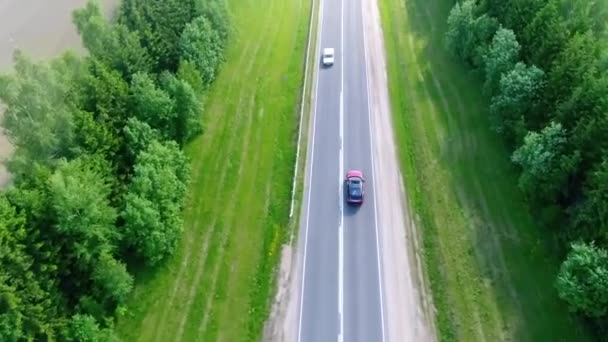 The car rides on a countryside road — Stock Video