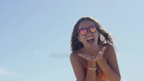 Woman in bikini blowing a kiss — Stock Video