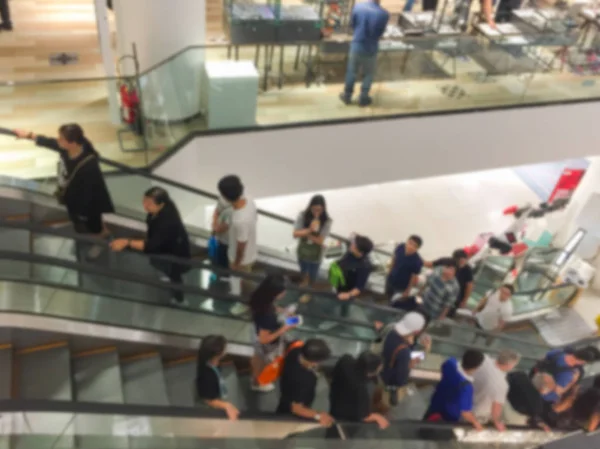 Abstract blur . People in motion in escalators — Stock Photo, Image