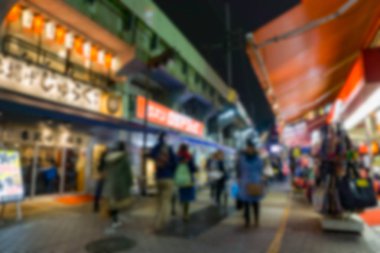 Blurred background . Ameyoko Market in evening.Ameyoko is a busy clipart
