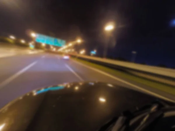 Abstract blurred . Speed driving car in the night on the highway — Stock Photo, Image
