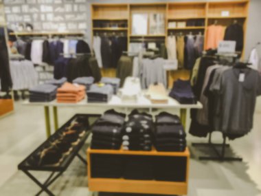 Bulanık görüntü arka plan giyim mağazasında alışveriş merkezi ile