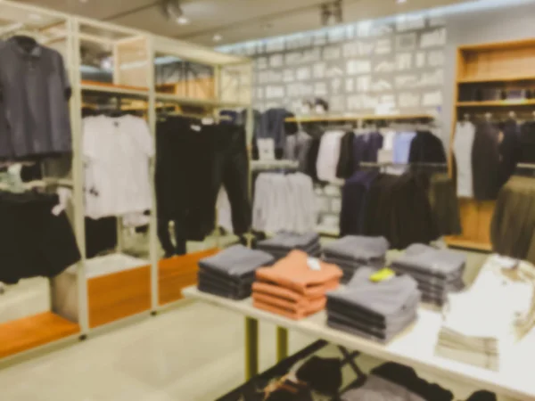 在一家购物中心的服装店模糊的图像背景 — 图库照片