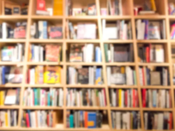 Vintage style color tone . Blur image of a bookstore — Stock Photo, Image