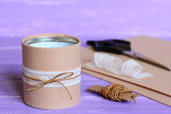 Recycling tin cans into organizer to contain pens, pencils, markers and other office supplies. Easy recycled craft idea. Materials and tools for art work on a wooden table. Closeup — Stock Photo, Image