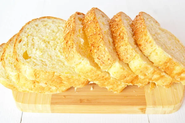 Sliced corn bread with sesame seeds