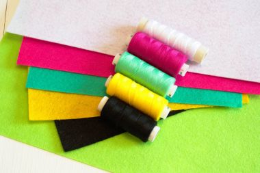 Sewing set, how to make a felt toy. Sewing concept. Colored felt set. Colored thread set clipart