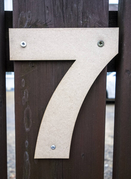 Written Wording in Distressed State Typography Found Number Seven