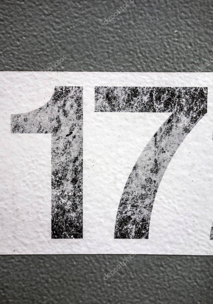 Written Wording in Distressed State Typography Found Number Seventeen