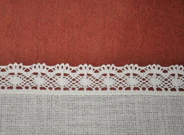 Tekstil kırmızı kahverengi ve Fildişi beyaz dantel yatay arka plan ışık gradyan ile