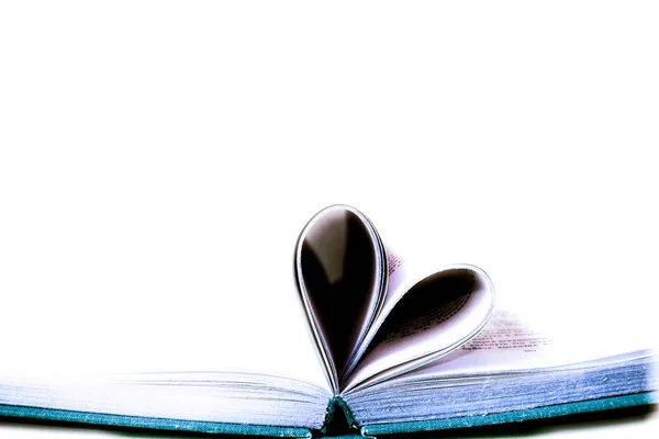 Love concept, book pages curved into heart isolated on white background — Stock Photo, Image