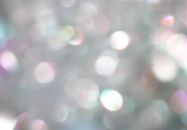 Silber Bokeh verschwommen glänzende Magie Glanz Glamour Hintergrund — Stockfoto