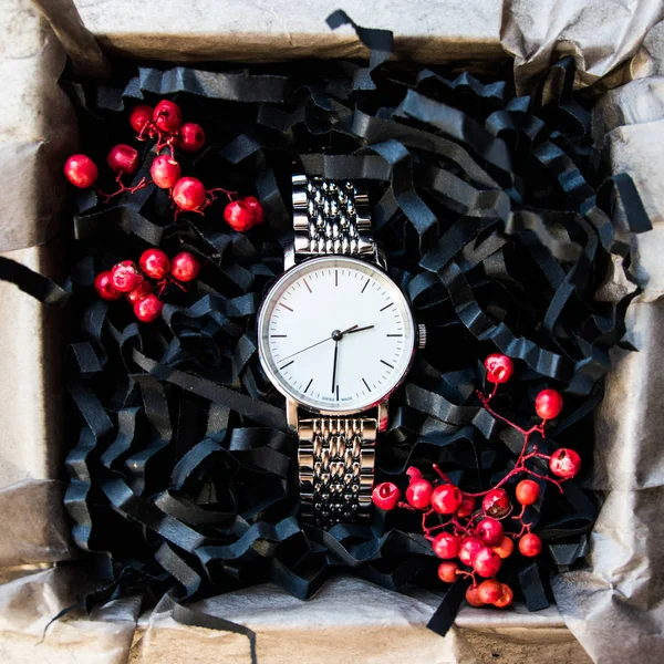 Beautiful masculine gifts, watches in beautiful packaging / craft gifts for him and bright filling, gift clocks