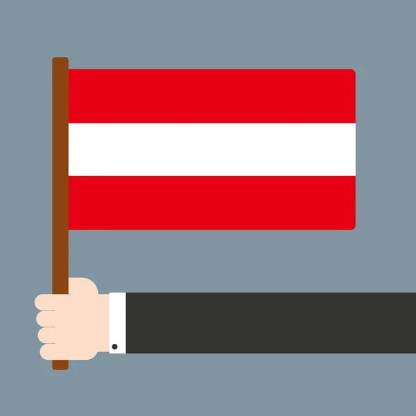 Hand holding Osterreich flag — Stock Photo, Image