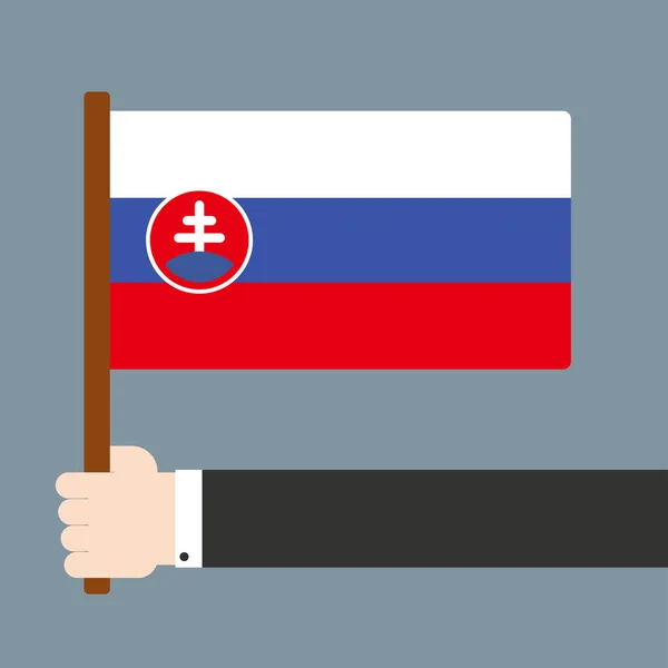 Ruka držící Slovensko vlajka — Stock fotografie