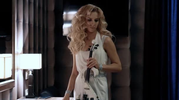 Slow Motion Caucasian Violinist Girl On A Black Background. Closeup. — Stock Video