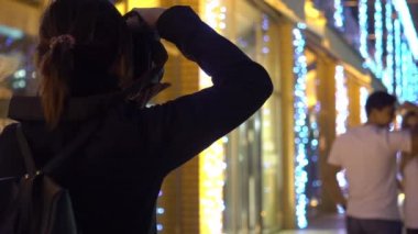 Aşık çift resim çekmek hareket fotoğrafçı yavaş