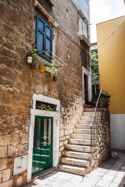 The staircase leading up in the yard.