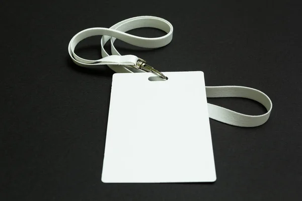 White blank cardboard tag isolated on black background — Stock Photo, Image