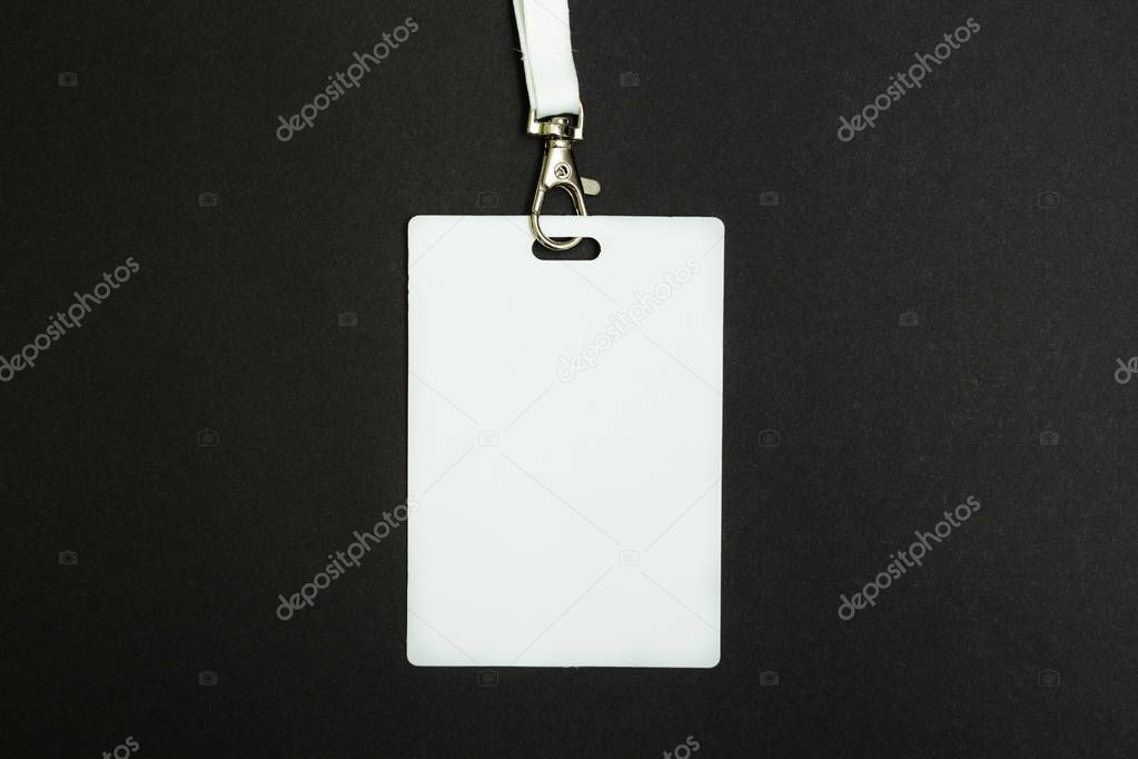 Blank Security Tag with Neck Band Isolated on Black Background.